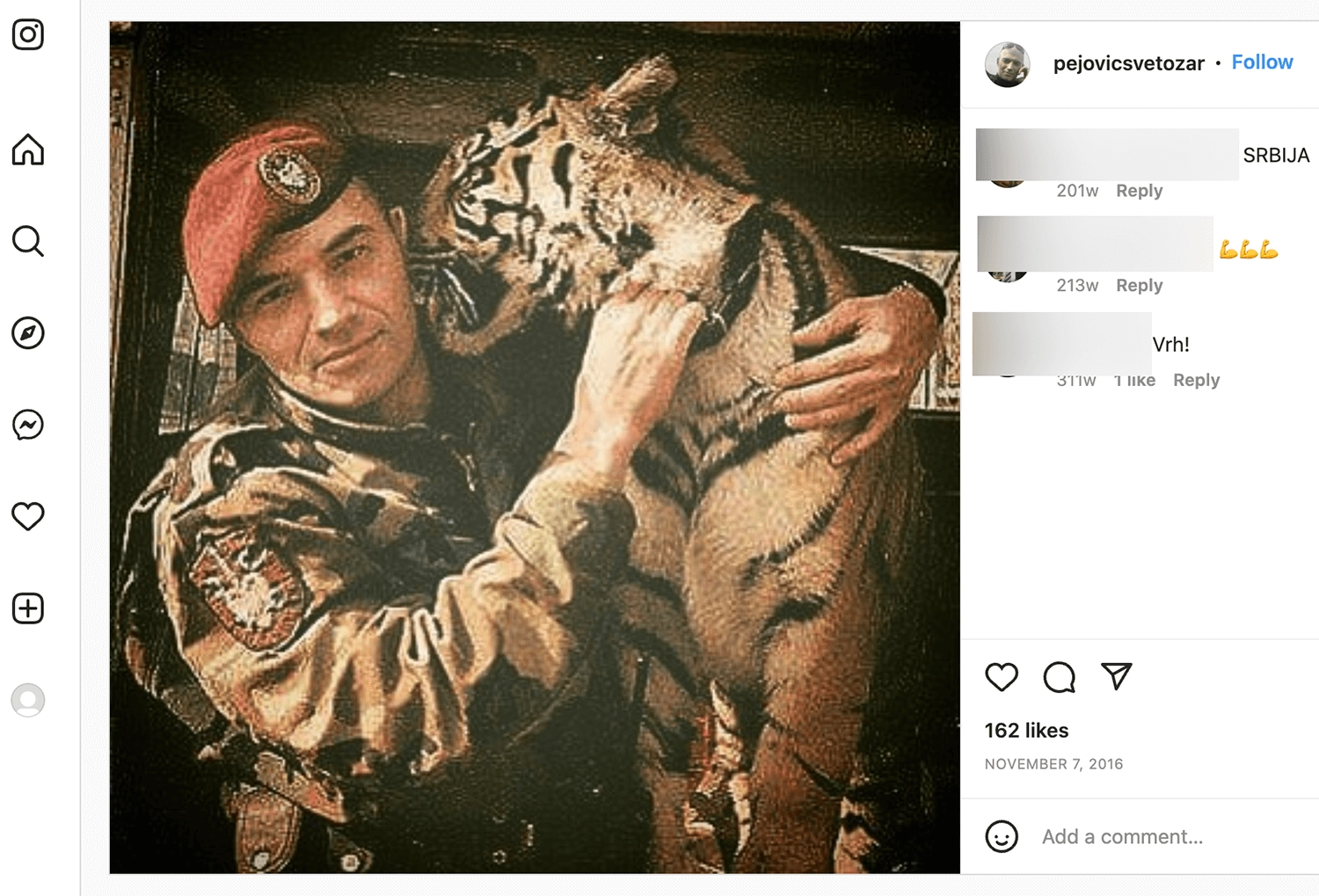 Svetozar Pejović, a former member of Arkan's Tigers, poses with a tiger in an undated image posted on his Instagram.